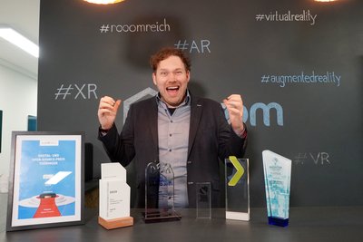 Hans Estner with awards